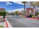 Community entrance gate with desert landscaping and signage at 644 Chase Tree St, Las Vegas, NV 89144