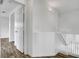 Bright upstairs hallway with natural light and wood flooring at 644 Chase Tree St, Las Vegas, NV 89144