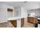 Spacious eat-in kitchen with stainless steel appliances and modern cabinets at 644 Chase Tree St, Las Vegas, NV 89144