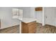 Kitchen island with tiled counter and wooden cabinets and drawers at 644 Chase Tree St, Las Vegas, NV 89144