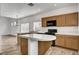 Kitchen with island, eat-in breakfast bar, stainless steel appliances at 644 Chase Tree St, Las Vegas, NV 89144