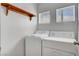 Convenient laundry room featuring washer and dryer hookups and natural light at 644 Chase Tree St, Las Vegas, NV 89144