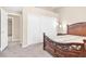 Bedroom features large closet, ornate bed, and an ensuite bathroom at 6440 High Sierra Ave, Las Vegas, NV 89156