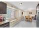 A kitchen dining room features a breakfast nook and a wooden dining table at 6440 High Sierra Ave, Las Vegas, NV 89156