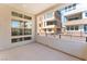 This balcony features an open-air design, offering views of the neighborhood with a sleek black railing at 647 Spotted Falcon St, Las Vegas, NV 89138