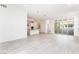 Open-concept living area seamlessly connects the kitchen and has access to the deck at 647 Spotted Falcon St, Las Vegas, NV 89138
