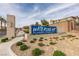 Watercolor Planned Community sign with manicured landscaping, showcasing a welcoming entrance to the neighborhood at 6804 Sage Gold Ct, North Las Vegas, NV 89086