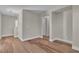 Open hallway featuring wood-look floors and neutral walls at 7632 Calico Fields St, Las Vegas, NV 89149