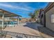 Community pool featuring comfortable lounge chairs, offering residents a relaxing space at 7632 Calico Fields St, Las Vegas, NV 89149