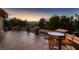 Spacious balcony with elegant outdoor seating and stunning views of the surrounding landscape, perfect for relaxation at 8396 Garnet Canyon Ln, Las Vegas, NV 89129