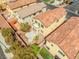 An aerial view of a well-maintained home showcasing the backyard with rock and concrete patio at 8453 Cheerful Brook Ave, Las Vegas, NV 89143