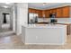 Kitchen with white counter tops, stainless steel appliances, and tile flooring at 8453 Cheerful Brook Ave, Las Vegas, NV 89143