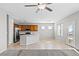 Kitchen with stainless appliances, tile floors, and an island at 8453 Cheerful Brook Ave, Las Vegas, NV 89143