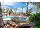 Community pool area features an in-ground pool, spa, and lounge area at 913 Duckhorn Ct # 201, Las Vegas, NV 89144