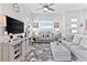 Stylish living room features neutral furniture, modern decor, and a plush rug at 916 Belleforte Ln, Las Vegas, NV 89138