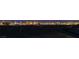 Night view of a city skyline with bright lights at 916 Belleforte Ln, Las Vegas, NV 89138