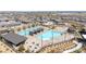 Resort-style pool area with cabanas, chaise lounges, and desert landscaping in a home community at 916 Belleforte Ln, Las Vegas, NV 89138