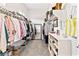 Large walk-in closet offers ample storage space with shelves, rods, and a full-length mirror at 916 Belleforte Ln, Las Vegas, NV 89138