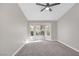 Spacious bedroom with neutral carpet, ceiling fan, and bay window for natural light at 9513 Yucca Blossom Dr, Las Vegas, NV 89134