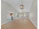 Spacious living room featuring hard surface floors with a view of the kitchen at 9513 Yucca Blossom Dr, Las Vegas, NV 89134