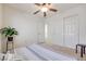 Bedroom with carpeted floors, closet, ceiling fan and access to other rooms at 953 Wagner Valley St, Henderson, NV 89052