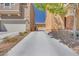 Long driveway leading to the home with well-maintained landscaping at 953 Wagner Valley St, Henderson, NV 89052