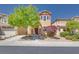 Charming two-story home with a manicured front yard and appealing curb appeal at 953 Wagner Valley St, Henderson, NV 89052