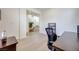 Bright office space with hardwood floors, a staircase, and views into the home at 953 Wagner Valley St, Henderson, NV 89052