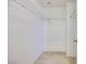 Empty walk-in closet with shelving installed and neutral carpeting at 953 Wagner Valley St, Henderson, NV 89052