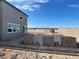 View of an unfinished backyard, ready for landscaping and personalization to create an outdoor oasis at 9548 Hinson St, Las Vegas, NV 89139