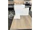 Design layout featuring a faucet and luxurious vinyl plank in Toasted Taupe at 9548 Hinson St, Las Vegas, NV 89139