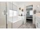 Bright bathroom featuring a tub, modern fixtures, and decorative accents, providing a relaxing space at 965 Nevada State Dr # 35101, Henderson, NV 89002