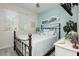 Comfortable bedroom featuring a stylish metal bed frame and calming coastal decor at 965 Nevada State Dr # 35101, Henderson, NV 89002