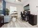 Comfortable living room featuring a gaming setup, mini-fridge, and a cozy sofa at 965 Nevada State Dr # 35101, Henderson, NV 89002