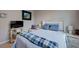 Comfortable bedroom featuring a well-made bed, soft lighting, and a television for entertainment at 9990 Perth Ct, Las Vegas, NV 89141