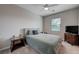 Bedroom featuring plush carpet, neutral walls, and a queen-sized bed, creating a comfortable and relaxing retreat at 9990 Perth Ct, Las Vegas, NV 89141