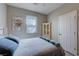 Bedroom with a neutral color scheme, featuring a comfortable bed and window at 9990 Perth Ct, Las Vegas, NV 89141