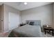 Bedroom featuring plush carpet, neutral walls, and a queen-sized bed, providing a serene and inviting atmosphere at 9990 Perth Ct, Las Vegas, NV 89141
