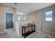Bright hallway featuring neutral walls, plush carpet, and a console table, creating a welcoming transition space at 9990 Perth Ct, Las Vegas, NV 89141