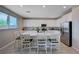 Bright kitchen with an island and stainless steel appliances, perfect for cooking and entertaining at 9990 Perth Ct, Las Vegas, NV 89141
