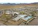 Aerial view of community clubhouse, pool, and mountain view at 12476 Heritage Bend Dr, Las Vegas, NV 89138