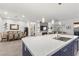 Gourmet kitchen with large island, open to dining area and living room for easy entertaining at 12476 Heritage Bend Dr, Las Vegas, NV 89138