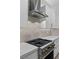 Modern kitchen featuring stainless steel appliances, a gas range, and stylish white cabinetry at 12476 Heritage Bend Dr, Las Vegas, NV 89138