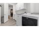 Well-equipped laundry room with updated appliances and direct access to a spacious walk-in closet at 12476 Heritage Bend Dr, Las Vegas, NV 89138