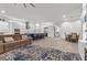 Open concept living room, kitchen and dining area great for entertaining at 12476 Heritage Bend Dr, Las Vegas, NV 89138