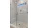 Elegant glass shower featuring stylish tile, bench seat and a convenient niche at 12476 Heritage Bend Dr, Las Vegas, NV 89138