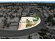 Single story home in a suburban neighborhood featuring a private pool and landscaping at 2212 Marble Gorge Dr, Las Vegas, NV 89117