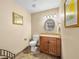 Clean and well-lit bathroom with a vanity and a toilet, offering a functional space at 2212 Marble Gorge Dr, Las Vegas, NV 89117