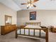 Inviting bedroom with a wood bed frame and dresser, offering a relaxing space to unwind at 2212 Marble Gorge Dr, Las Vegas, NV 89117