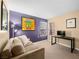Bedroom with a couch and desk area, featuring neutral walls and great natural light at 2212 Marble Gorge Dr, Las Vegas, NV 89117